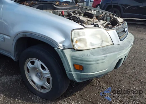 1999 Honda Cr-V Lx z USA, uszkodzony, nr VIN JHLRD1841XC024361